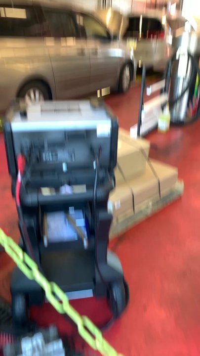 Walmart Supercenter - The workers are just standing around talking instead of working on the cars - Department Stores Near Me - Oxnard, California