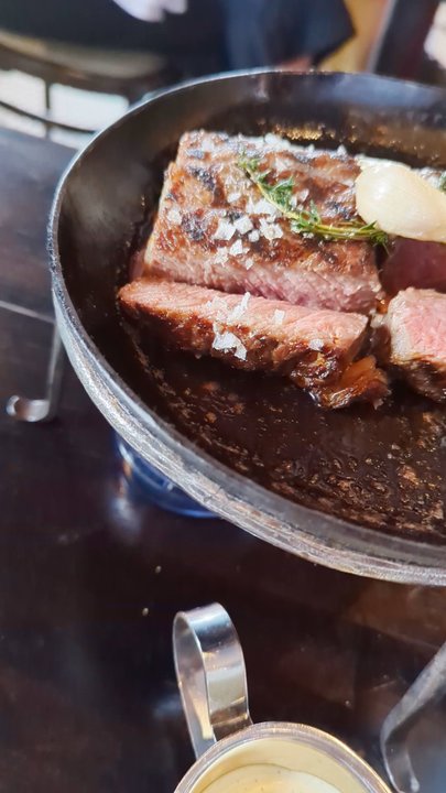 Bar Blanc - Steak. Medium rare. New York strip served with bearnaise sauce and French fries. Steak frites. - Cocktail Bars Near Me - Atlanta, Georgia