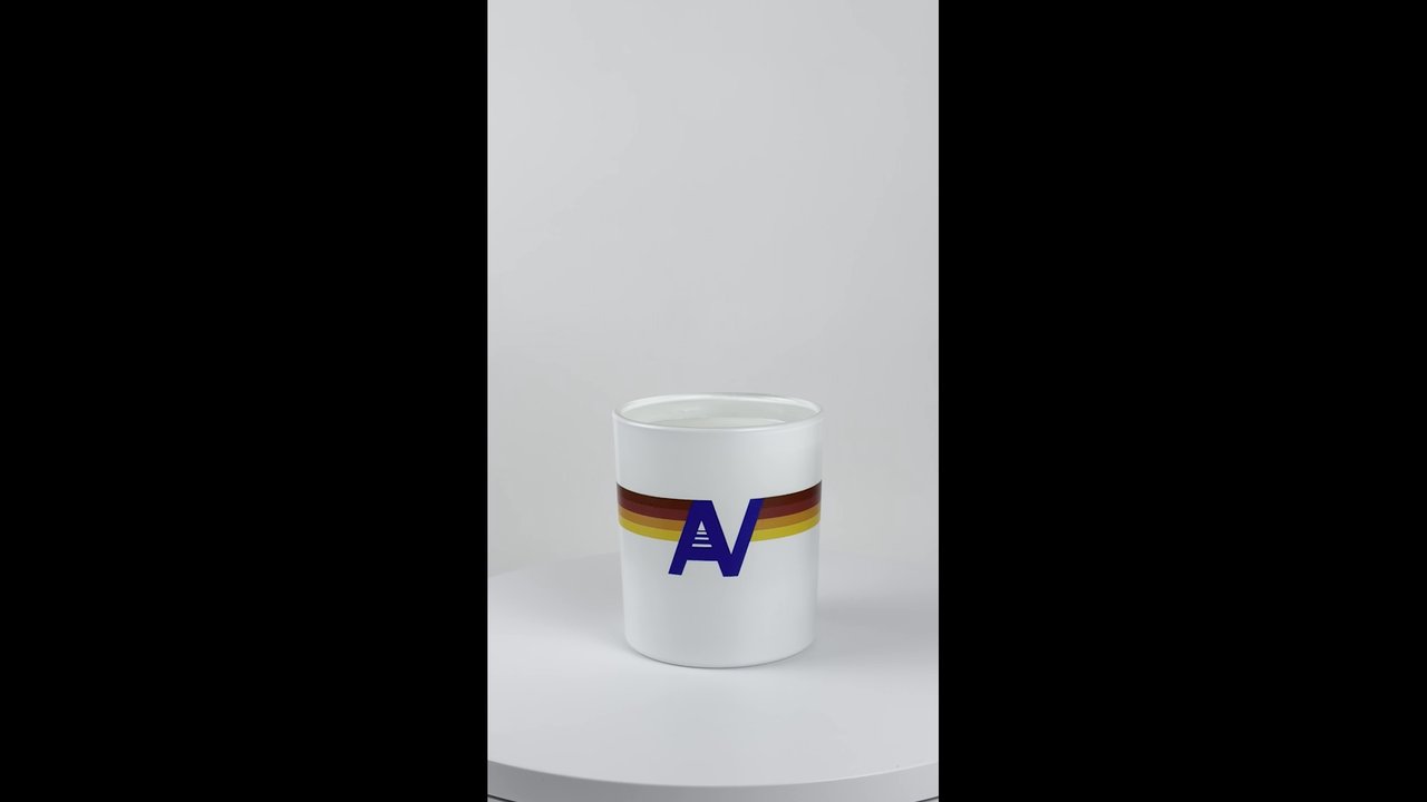 Custom Candles LA - A white candle with full color branding being lit with a match and flickering - Candle Stores Near Me - Carson, California