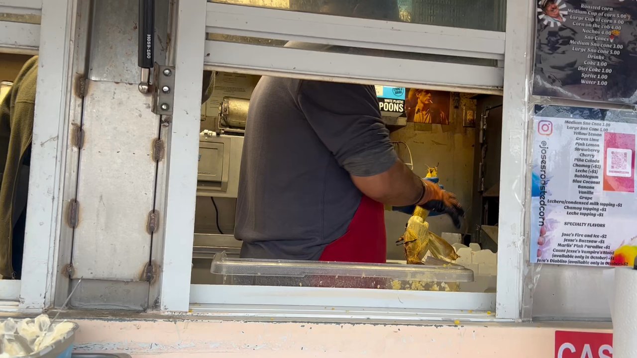 Jose's Roasted Corn - Corn master at work - Food Stands Near Me - Houston, Texas