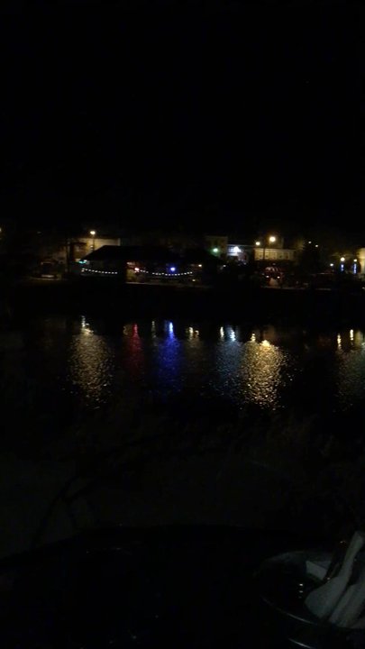 The Herons Landing - Outdoor patio along the river with a firepit - American Near Me - Jefferson, Wisconsin