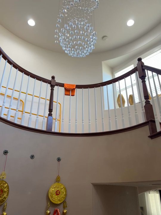 Andino Builders - 24 ft high installation chandelier - Handyman Near Me