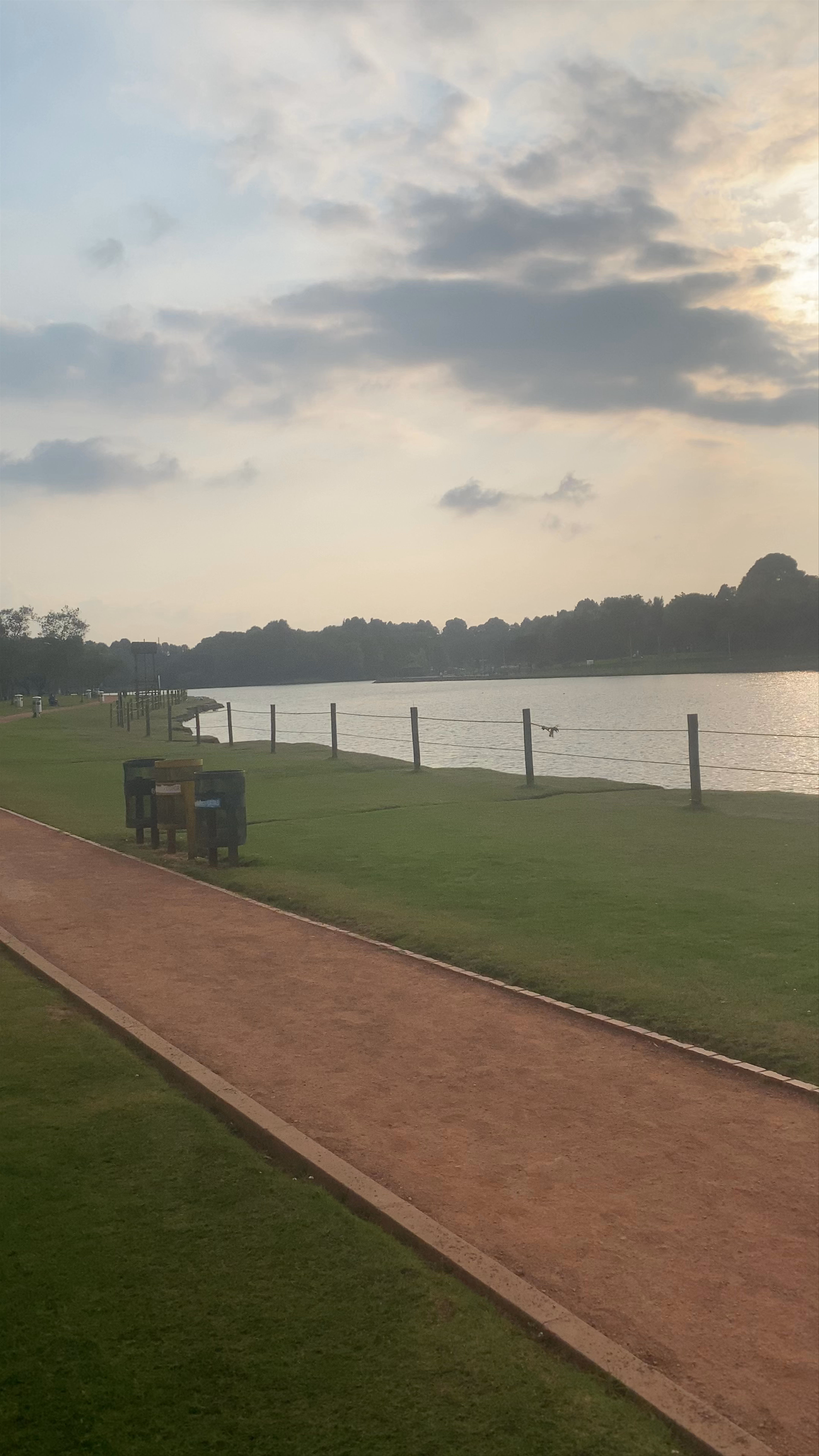 Serene Sunset Walk at Playa Parque Central Simón Bolívar, Bogotá