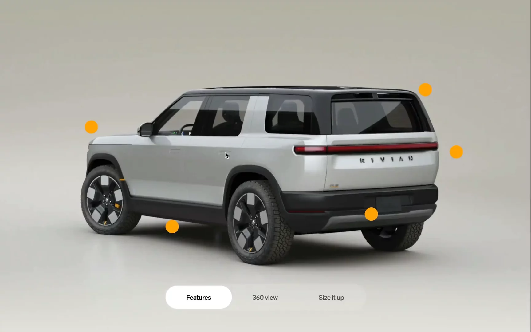 Rivian features page section with interactive modals