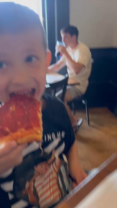 The Taproom & Grill - Baby boy crushing pizza - Sports Bars Near Me - Haddonfield, New Jersey