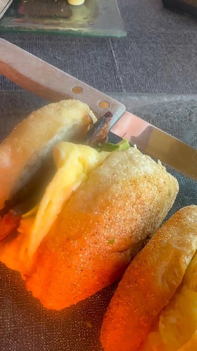 La Maison Cafe - Breakfast sandwich and eggs Benedict - his face was because he was jealous at first - Breakfast & Brunch Near Me - Newport, Oregon