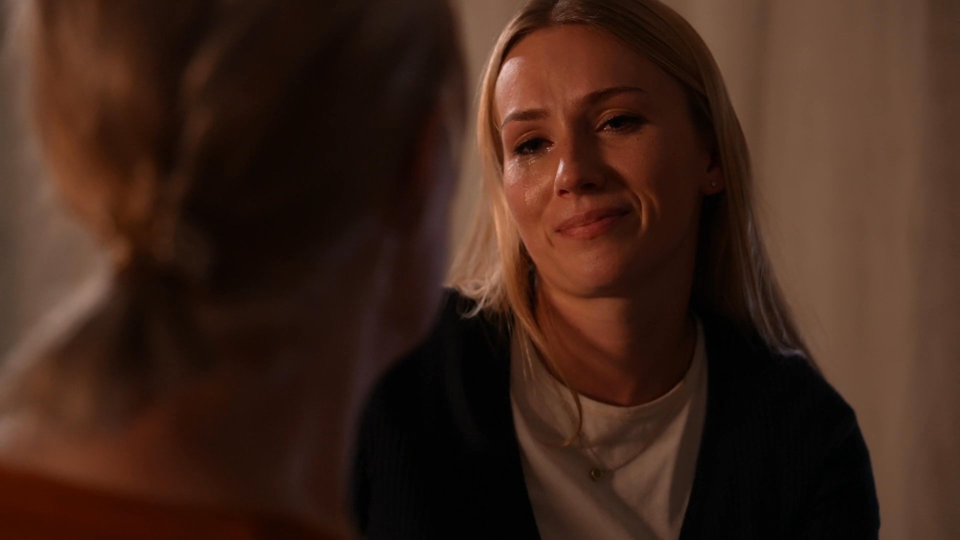 Two women share an intimate, heartfelt moment of reconciliation and mutual support. Through comforting touches and supportive conversation, they navigate a vulnerable emotional encounter.