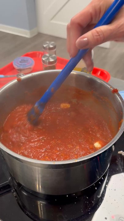 Flour Power Cooking Studios - Bubbling red sauce - Cooking Schools Near Me - Allen, Texas