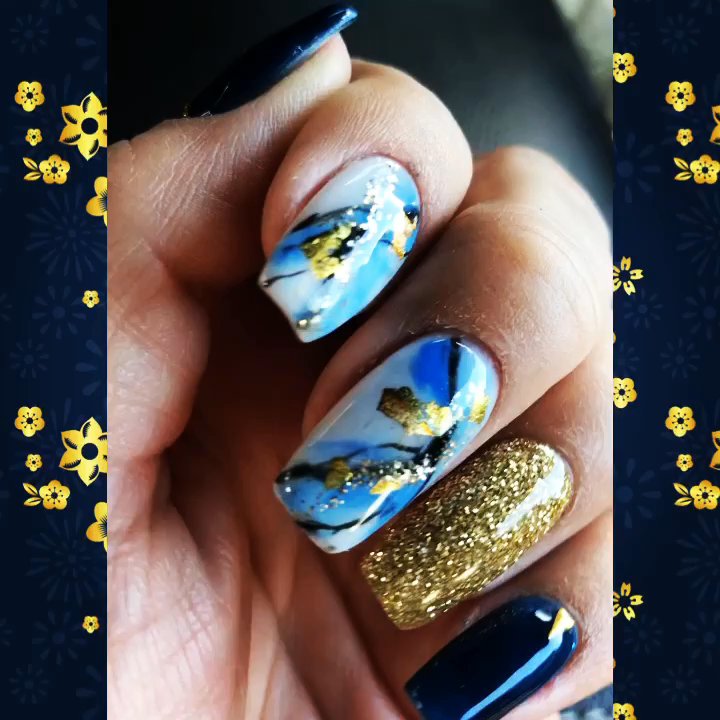 E'Shee Nails Spa - Navy color scheme was absolutely beautiful and rich. I also enjoyed the marbled nails with gold film and the accent glitter nails. - Waxing Near Me - Austin, Texas