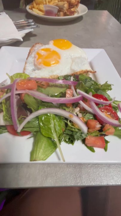 Little Tijuana - Avocado toast with Sunny side up egg and a side salad - Lounges Near Me - Newark, New Jersey