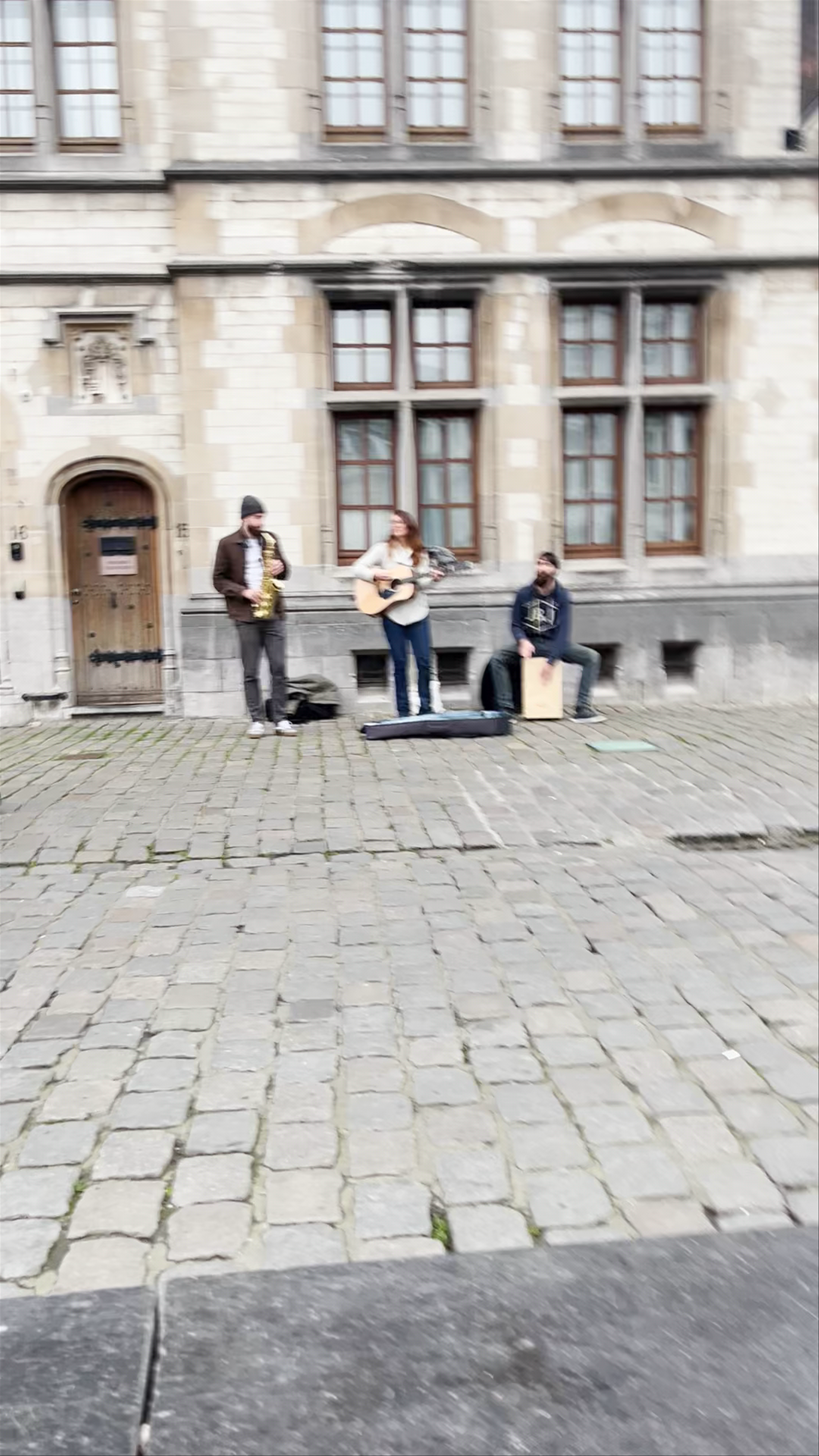 Street Music and Historic Charm at Graslei, Ghent
