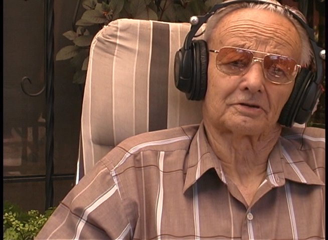 An elderly man named Harry reflects on his experiences while surfing in the ocean. The narrative transitions between his personal recount and archival footage of wave riding.