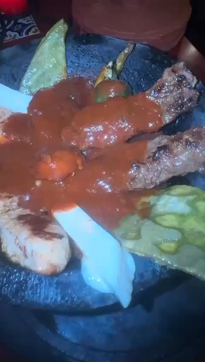 Don Chato - Don Chato molcajete, accompanying rice and fried beans and fajitas combo. Can't recommend these plates enough. So GOOD!!! - Cocktail Bars Near Me - Acton, California