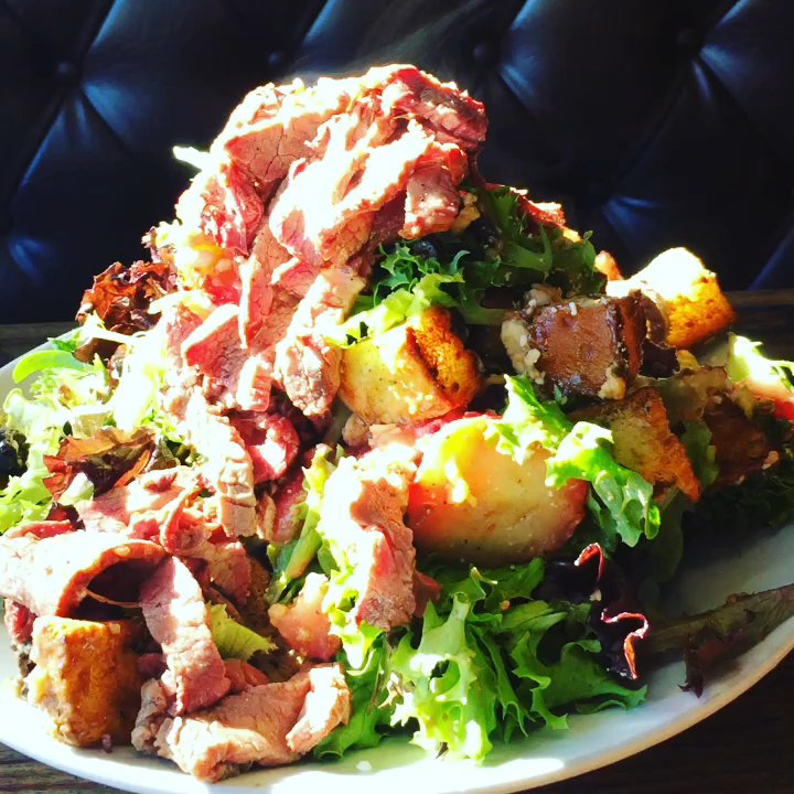 Bravo Farms - Hot steamy tri-tip on top of a huge salad mountain! - Cheese Shops Near Me - Tulare, California
