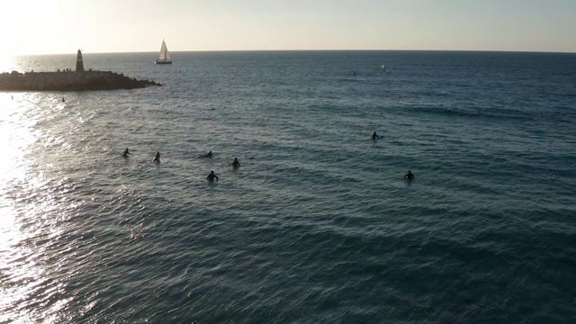 Surfers waiting for waves