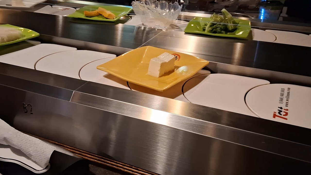 Mr Hot Pot - conveyor belt of goodies - Hot Pot Near Me - Spring Hill, Florida