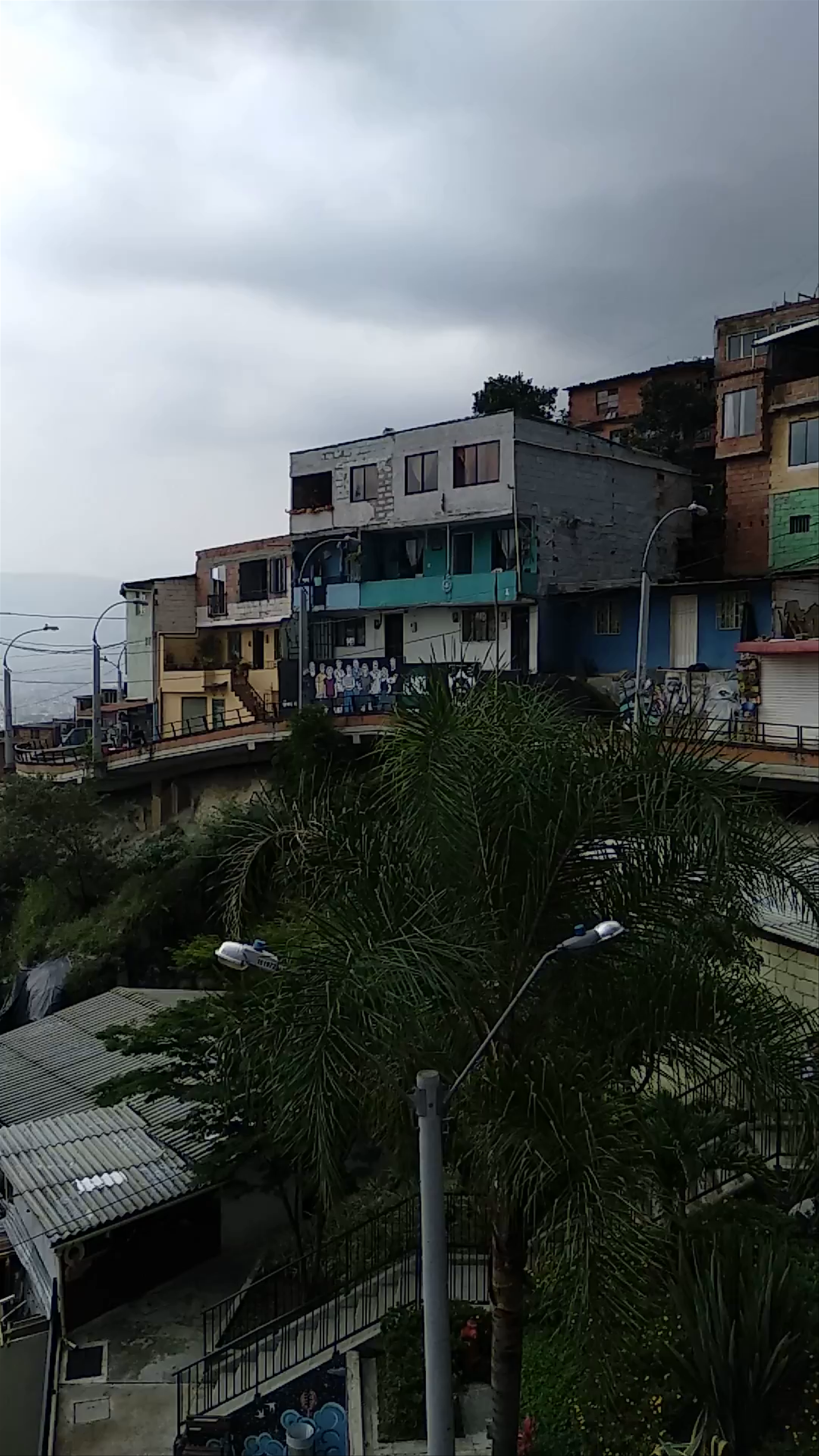 Comuna 13: Vibrant Street Life and Urban Views in Medellín