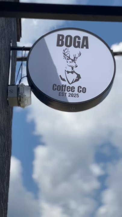 Boga Coffee - This is the outside sign with visitors entering the building - Coffee & Tea Near Me - Bogalusa, Louisiana