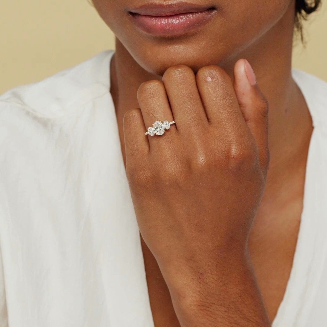 The Three Stone | Oval | 18k | White Gold | bandAccent: Pavé | sideStoneCarat: 0.25ct | sideStoneShape: Oval | diamondOrientation: vertical | caratWeight: other