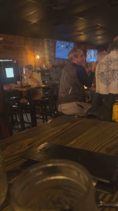 Rivertowne Public House - a lovely member of the group enjoying the awesome band - American Near Me - Mount Pleasant, South Carolina
