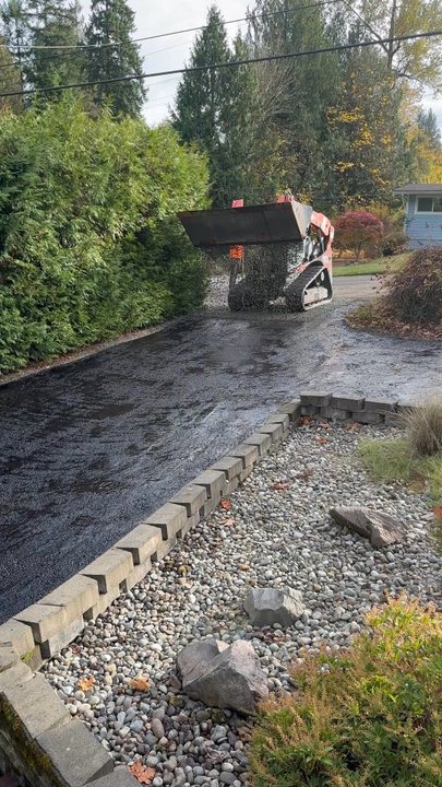 Premier Asphalt - Dropping the rock - Masonry/Concrete Near Me - Tacoma, Washington