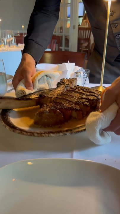 Prime 36 - The tomahawk steak, serving it piping hot. - Steakhouses Near Me - Warwick, New York
