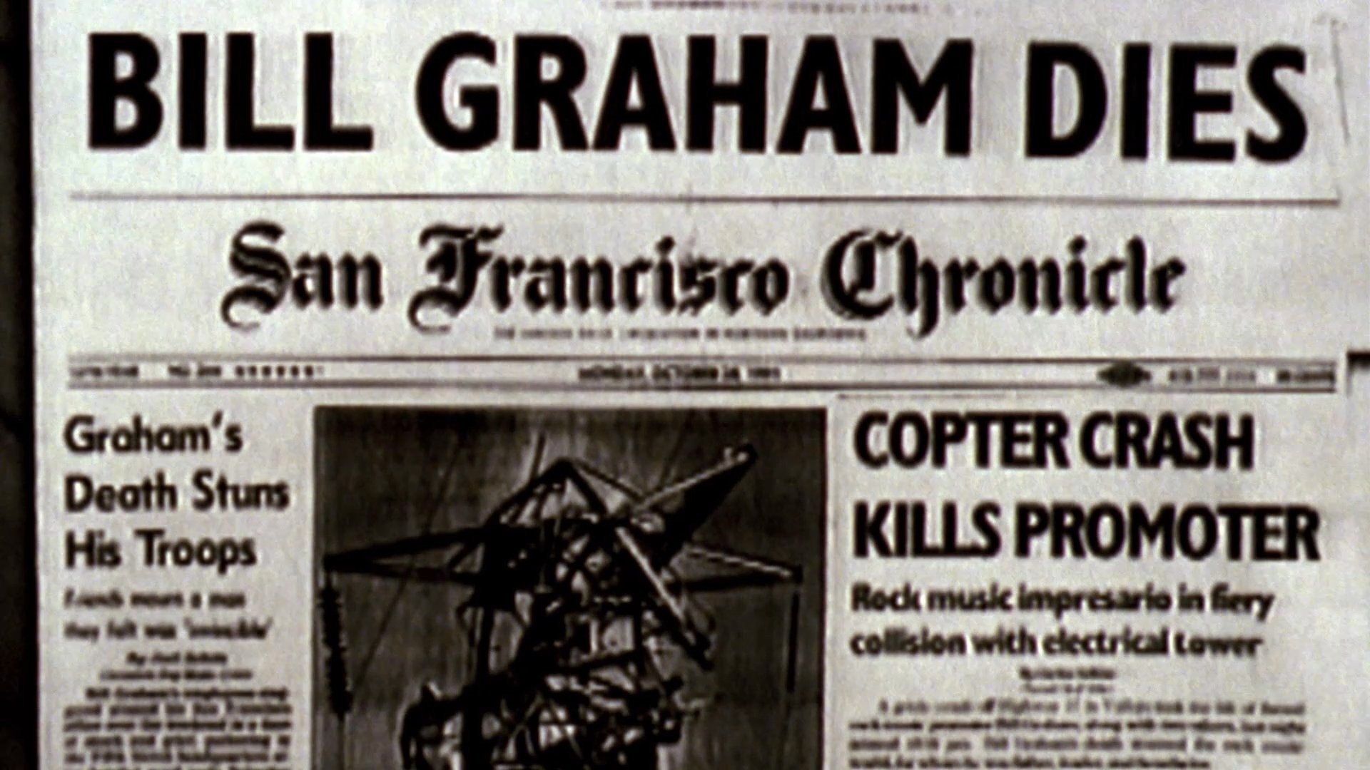 An animated sequence depicts a helicopter colliding with an electrical tower, followed by headlines from the San Francisco Chronicle reporting on the death of rock music promoter Bill Graham.