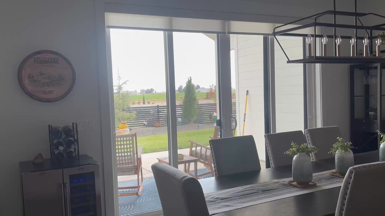 Blindsource - Motorized roller shades in the dining room. - Shutters Near Me - Meridian, Idaho
