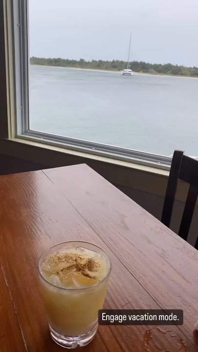 Front Street Grill - Indoor view with a yummy painkiller cocktail - Seafood Near Me - Beaufort, North Carolina