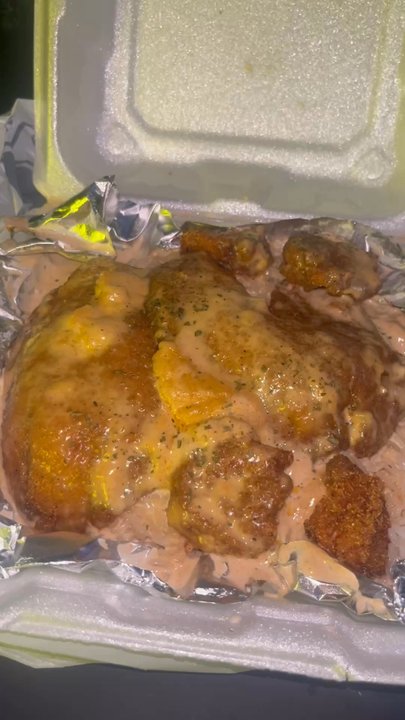 Bobobs - Fried fish over rice and cream sauce aka Hot Topic - Southern Near Me - Houston, Texas