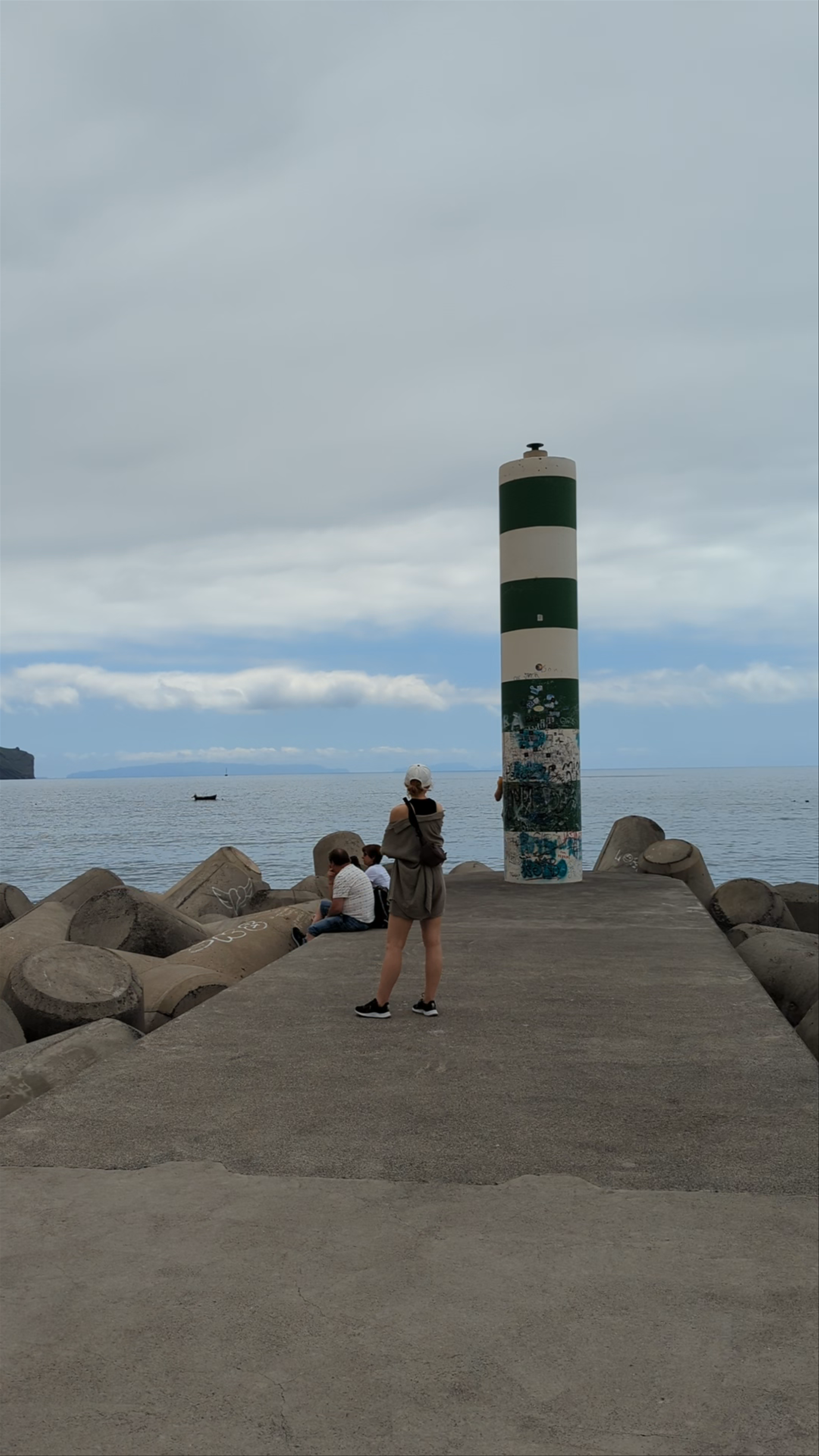 Serene Coastal Moments at the Green Lighttower, Porto, Portugal