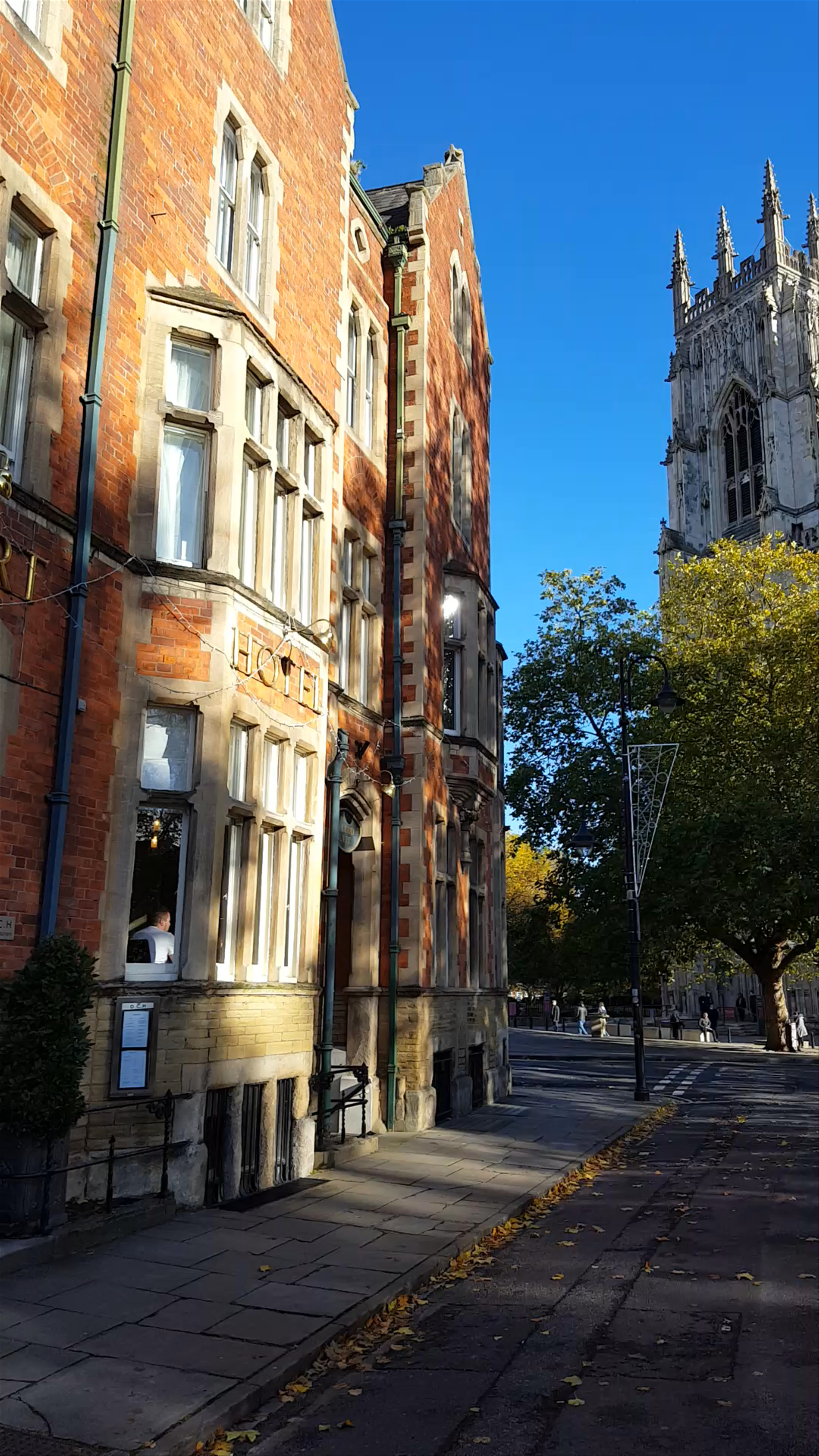 Autumn Sunlight on York Minster and Historic Streets