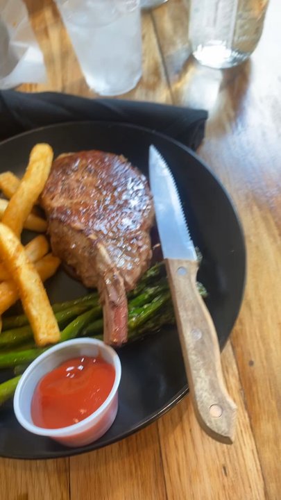 Cap & Cork - Pork chop meal and burger meal. - Tapas/Small Plates Near Me - Henderson, Kentucky