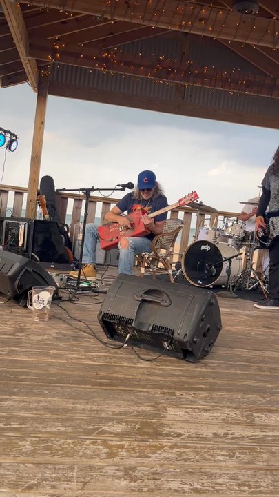 Reggie's on the Beach - Great atmosphere with awesome music. YES that is a 1951 Milwaukee sawzall box guitar! How cool!! - Venues & Event Spaces Near Me - Chicago, Illinois