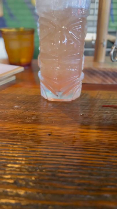 Bar Kapu - Get slung - signatur sunset sling (minus some sips) - Cocktail Bars Near Me - Bentonville, Arkansas