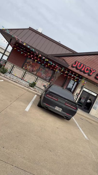 Juicy Seafood and Bar - The entrance to the Juicy Seafood and Bar on Vantage Point in Dallas. - Seafood Near Me - Dallas, Texas