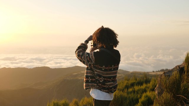 Photographer in mountains