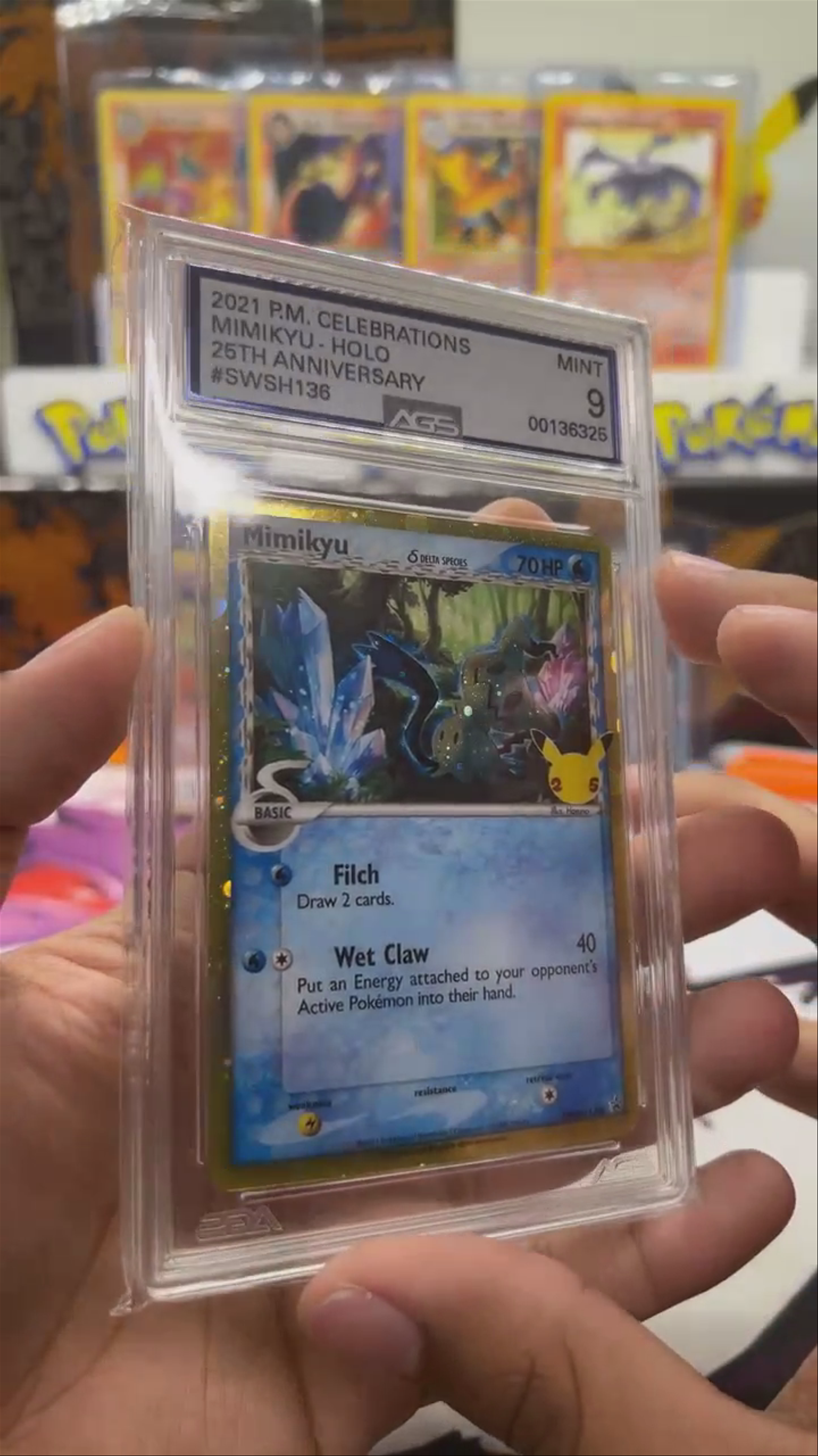 Cosmos Holo 25th Anniversary Golden Mimikyu