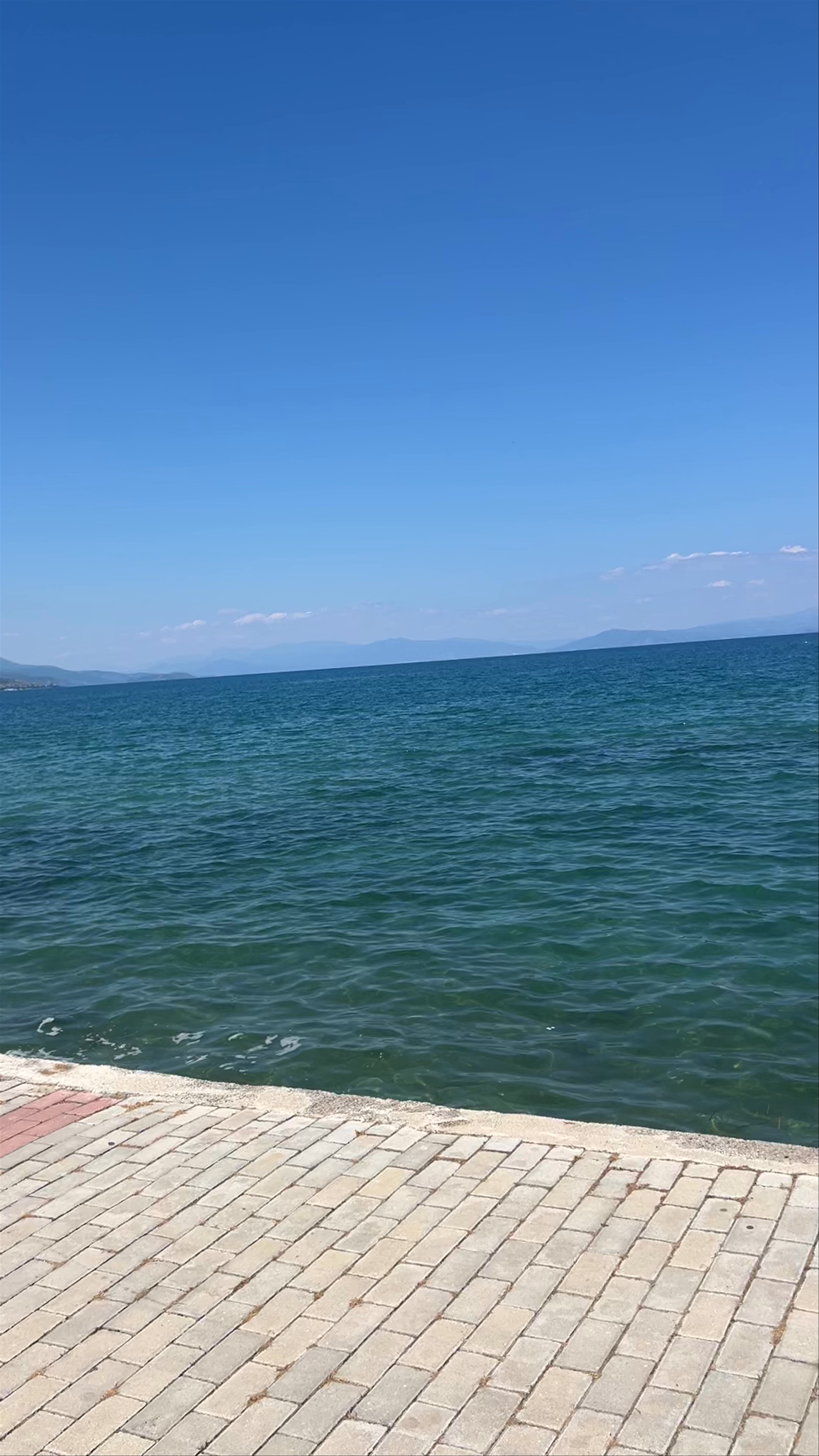 Serene Lakeside Stroll at Pogradec Beach, Albania