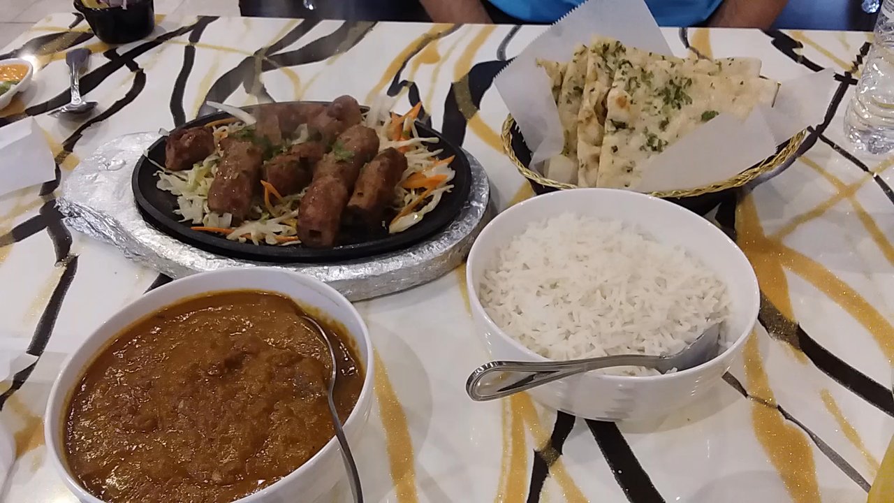 Joy's Biryani N Kababs - Lamb kabob, garlic naan, lamb chetinadu & rice - Indian Near Me - Pineville, North Carolina