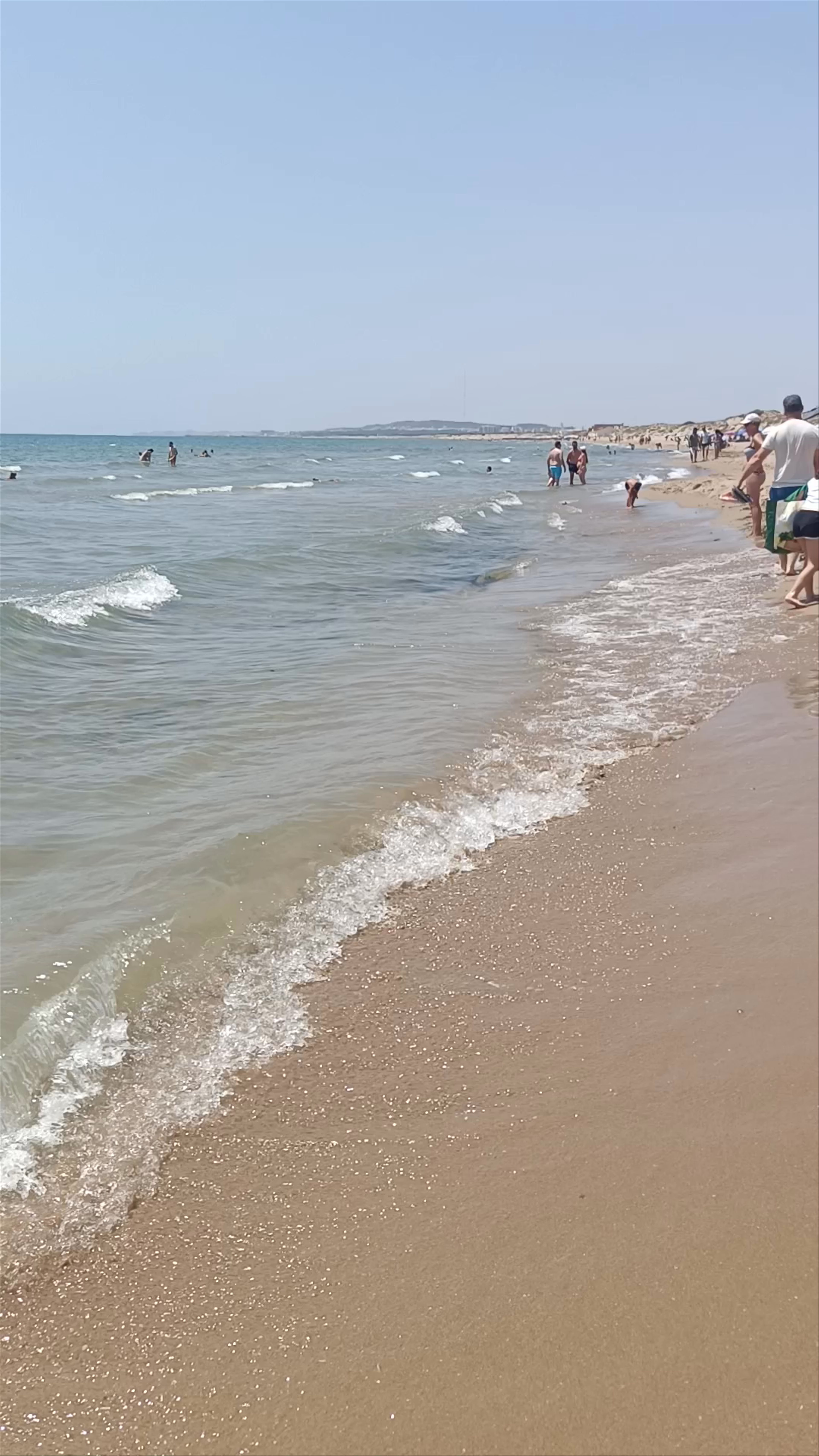 Sun-Kissed Serenity at Playa de El Pinet, Elche, Spain