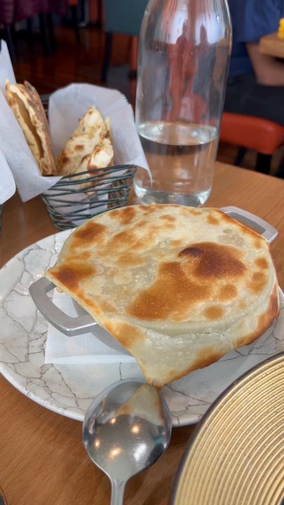 Aurum - Mushroom Butter Chicken (Makhani), comes in puff pastry that is cut by waiter - Indian Near Me - Los Altos, California