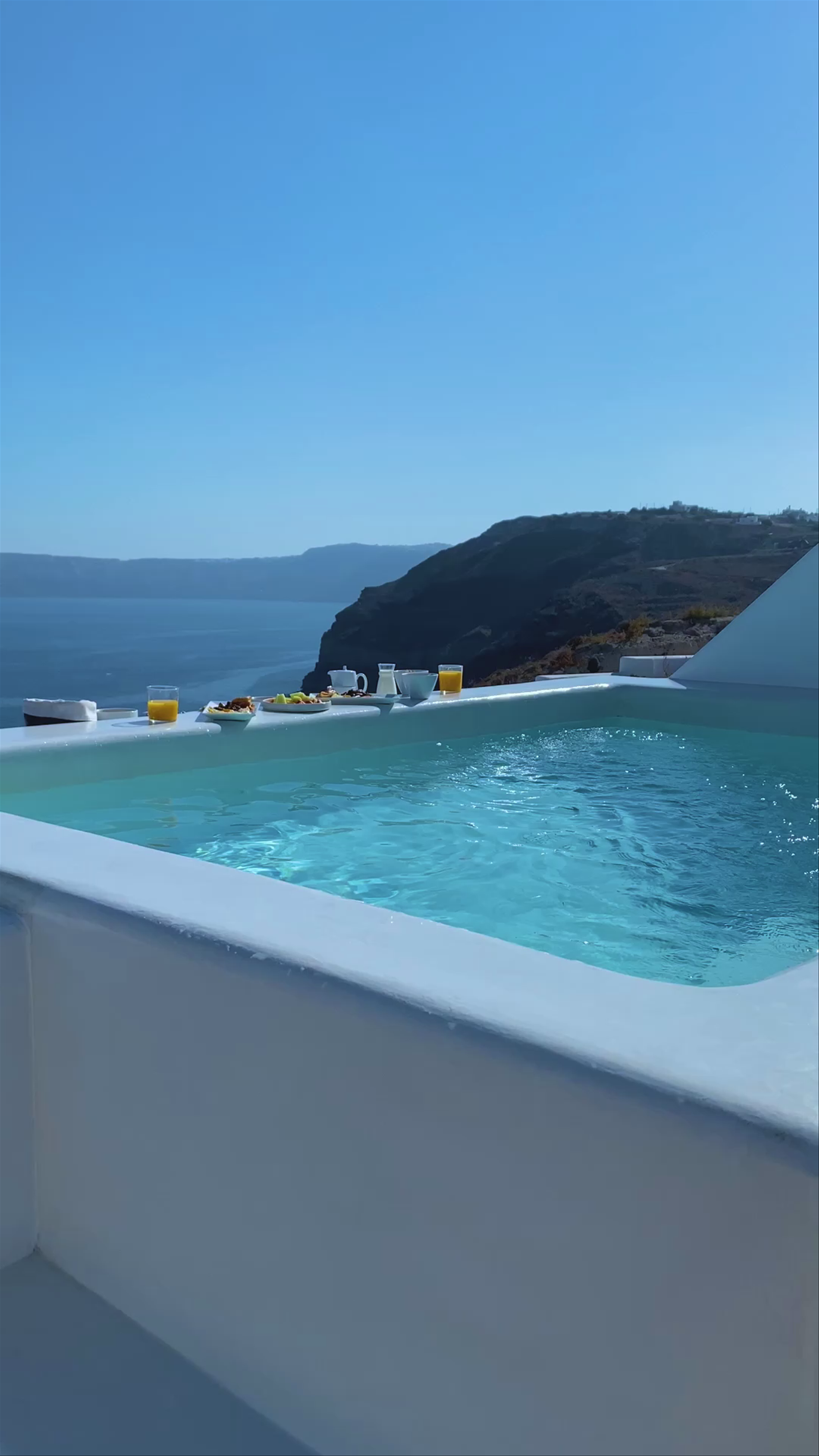Phōs Boutique Luxury Hotel & Villas: A Serene Breakfast with Santorini Views