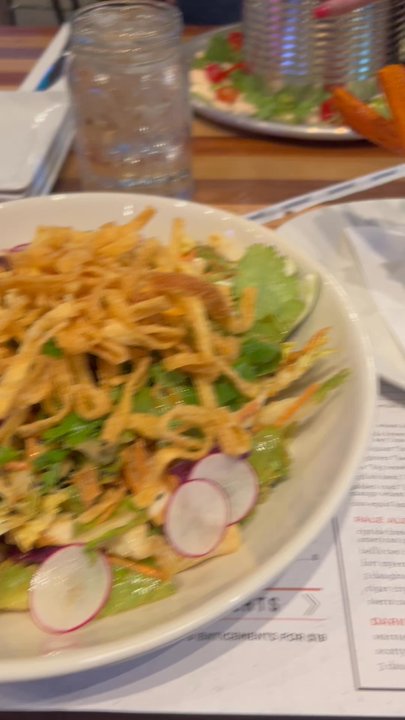 Alligient Stadium - Thai salad and nachos - Sports Bars Near Me - Charlotte Harbor, Florida