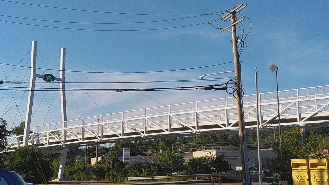 Big Boy - Bicycle bridge (white metal) next to the river and the canal, parking, random Subaru, Big Boy sign, and much more parking in the back. - Burgers Near Me - Valley View, Ohio