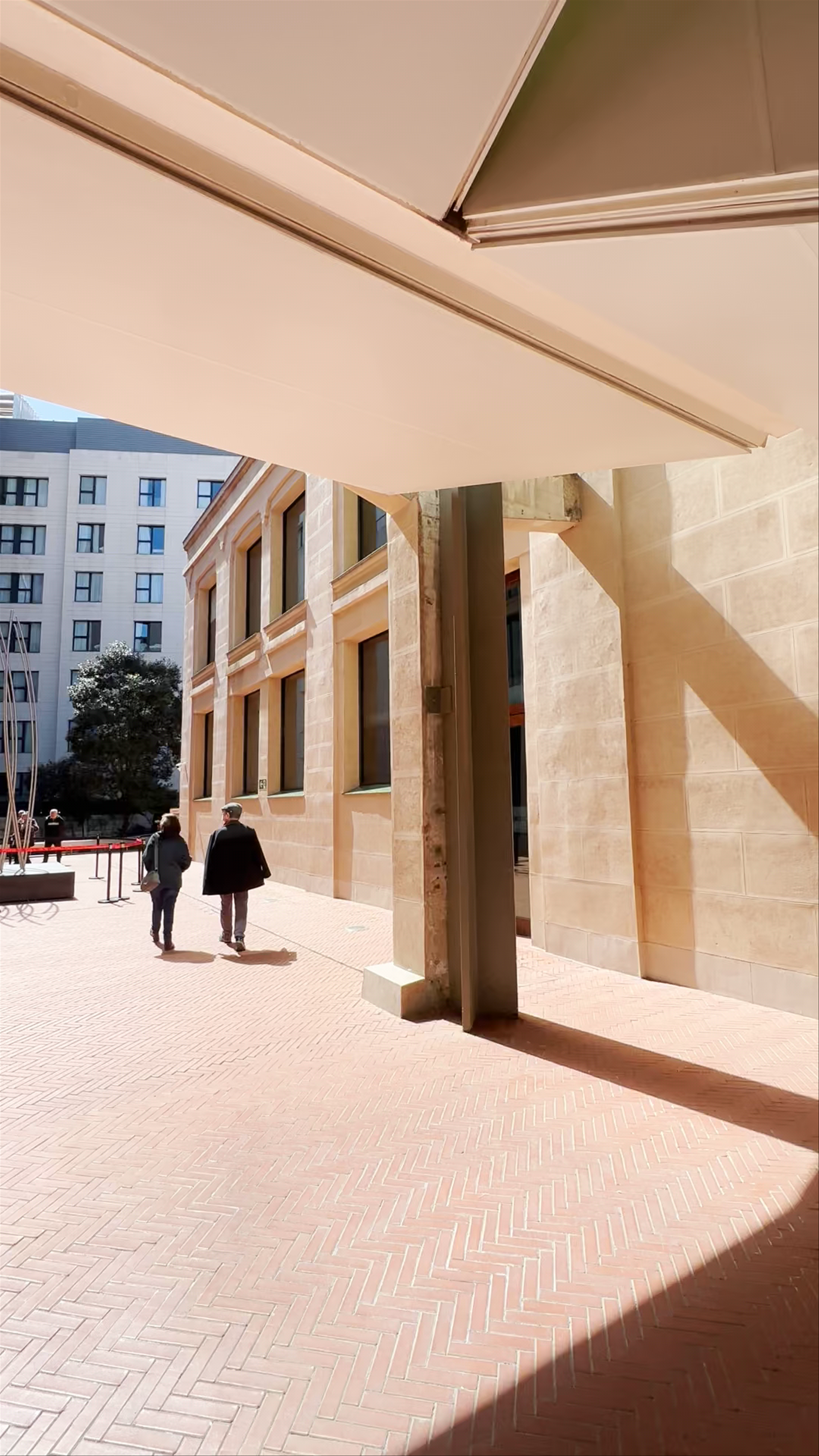 Sunlit Courtyard Walk at Espacio Cultural Serrería Belga, Madrid