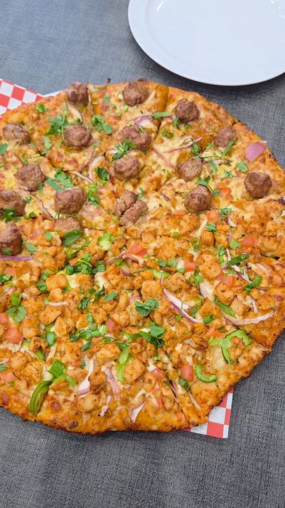 Curry On Pie - Large  1/2 Lamb Curry &  1/2 Butter Chicken Pizza ($31.99)  05-30-2026 - Pizza Near Me - Artesia, California