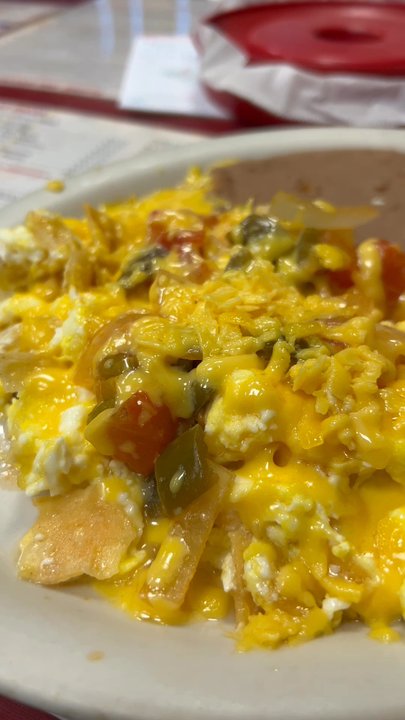 Oasis Cafe - Chilaquiles with flour tortillas - Cafes Near Me - San Antonio, Texas