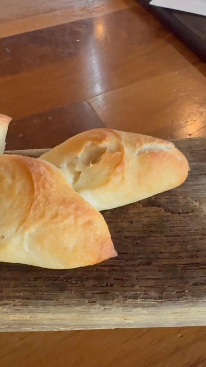 Coohills Restaurant - House Bread with House Butter is beautifully presented on a wooden board! - French Near Me - Denver, Colorado