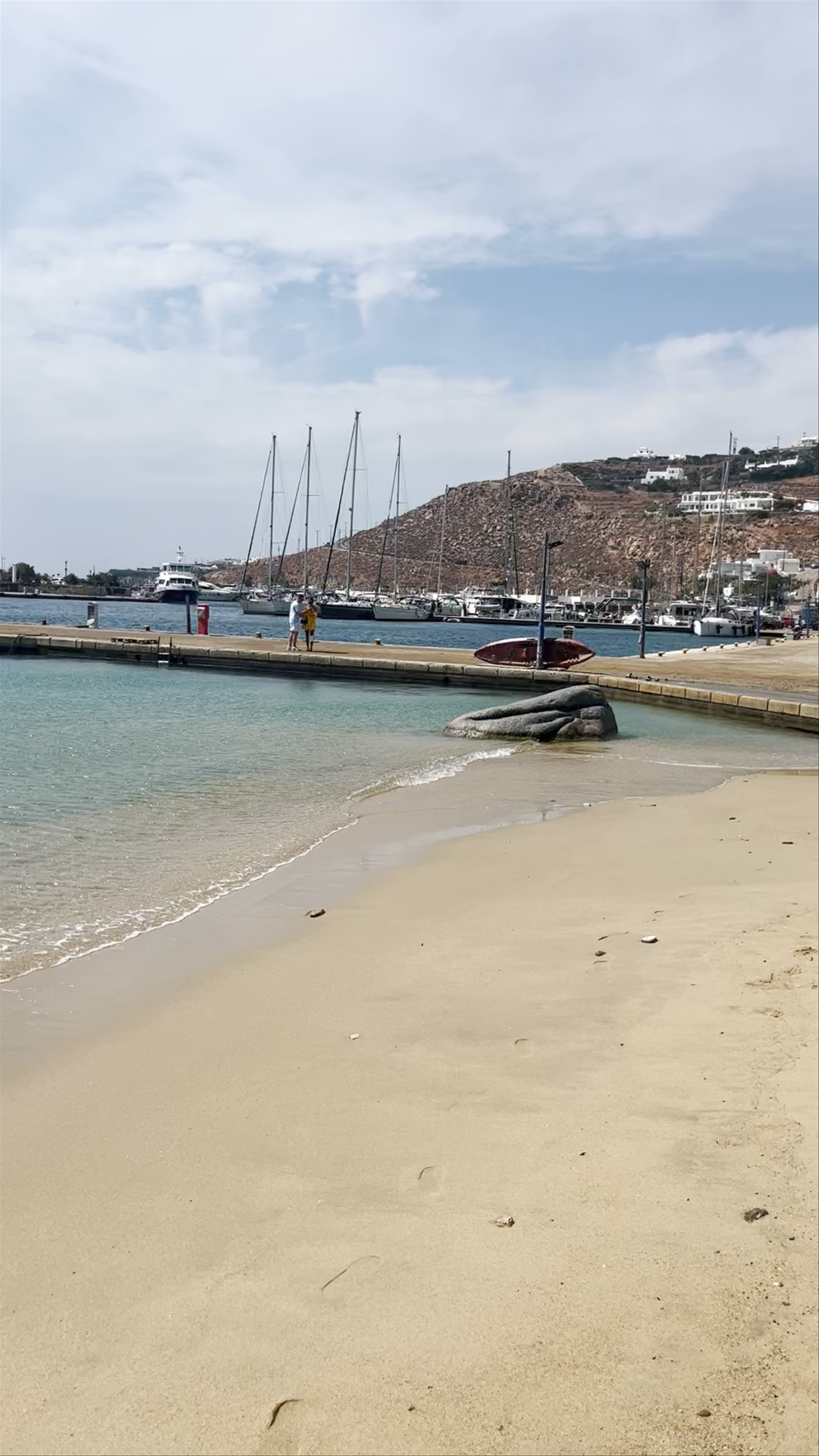 Serene Shores of Mykonos New Port in Tourlos, Greece